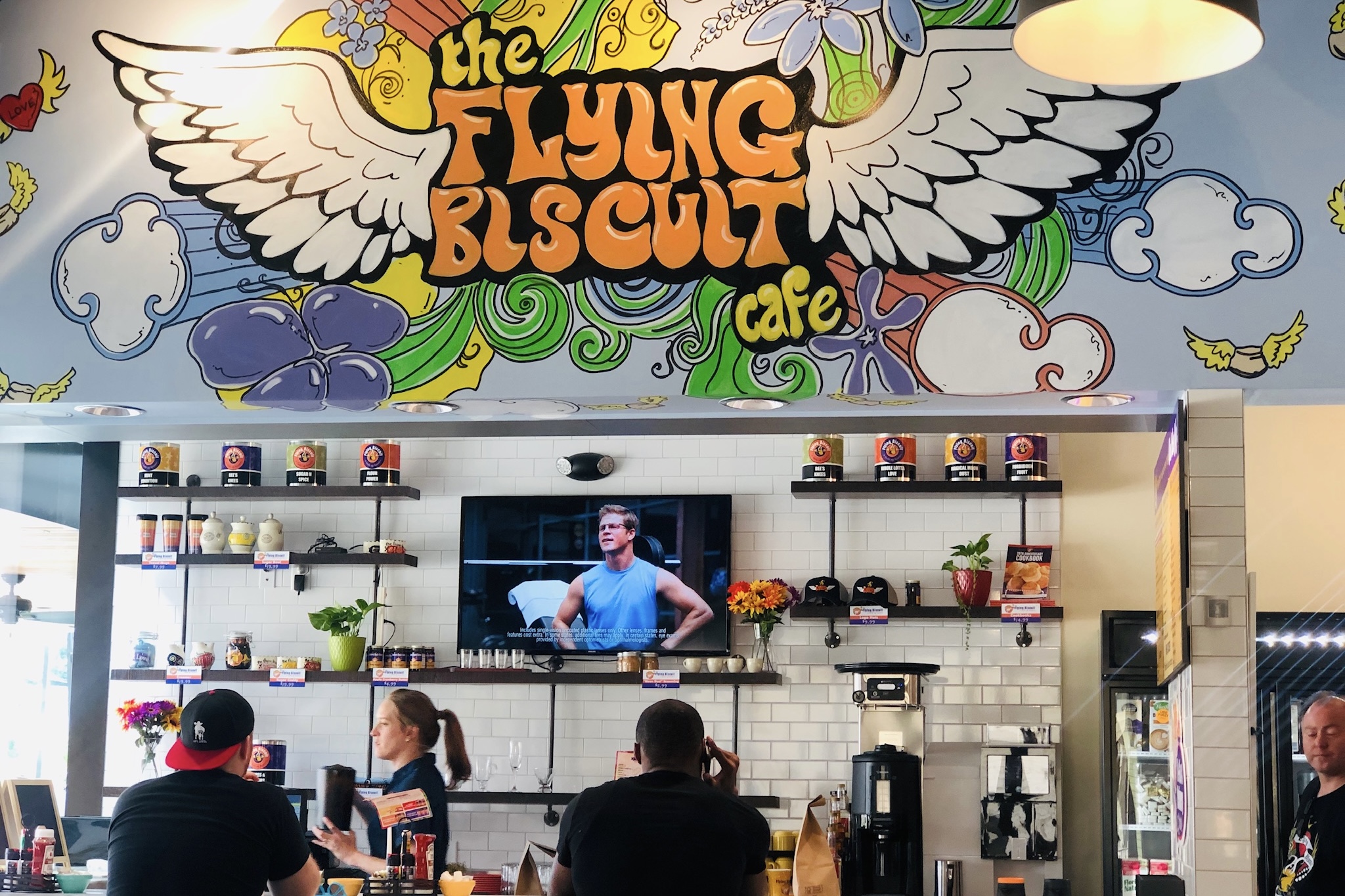 Flying Biscuit Cafe official franchising-site image showing the restaurant interior and guest experience.